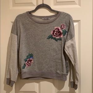 Trendy embroidered sweater